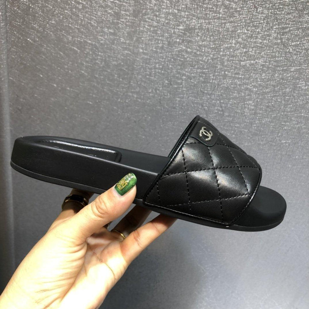 Chanel quilted Black slides