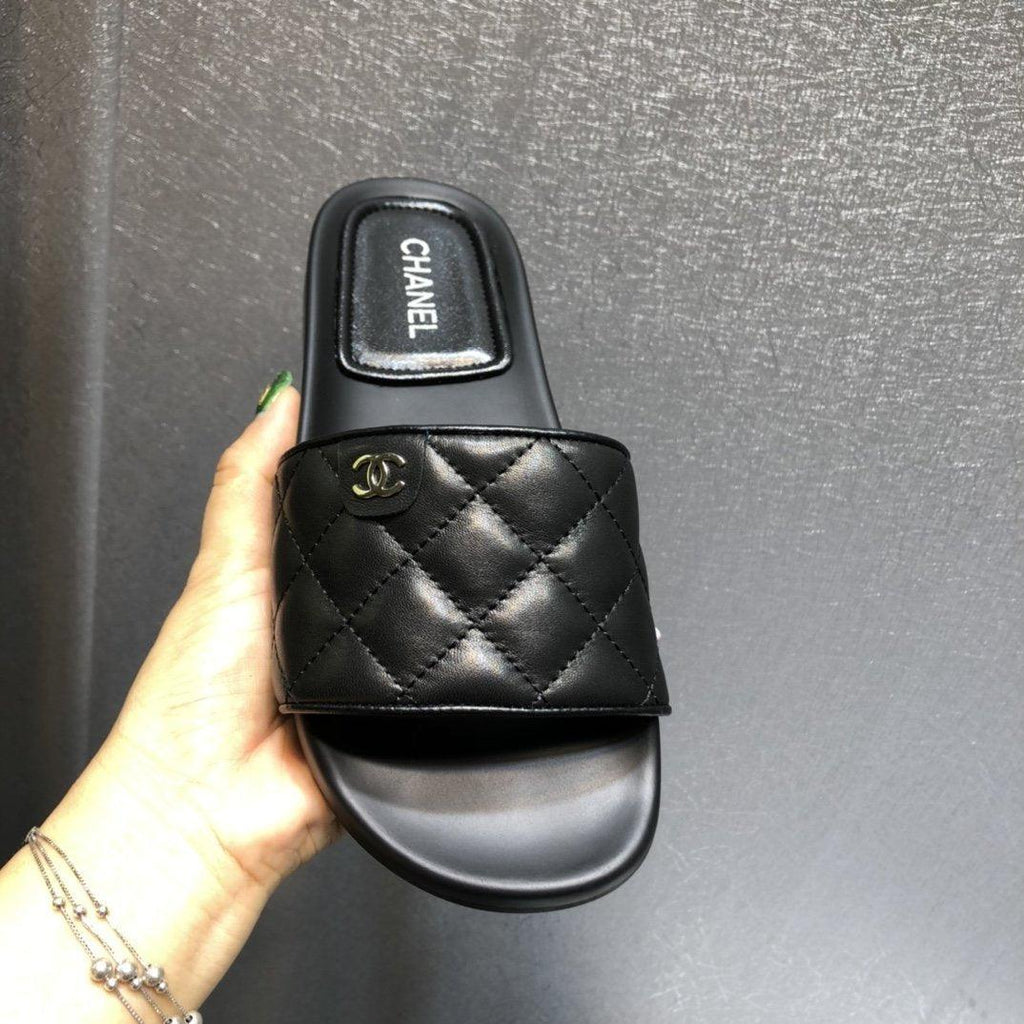 Chanel quilted Black slides