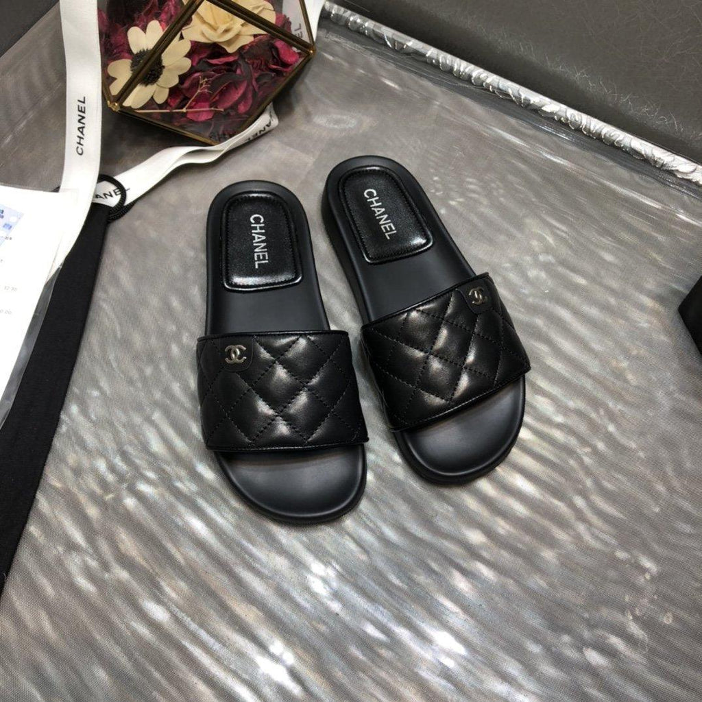 Chanel quilted Black slides