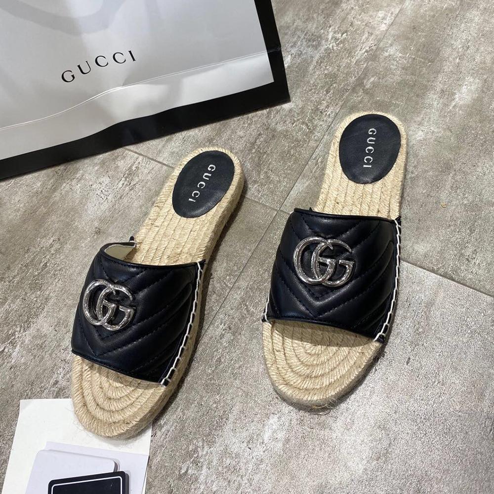 Gucci quilted leather slide sandals